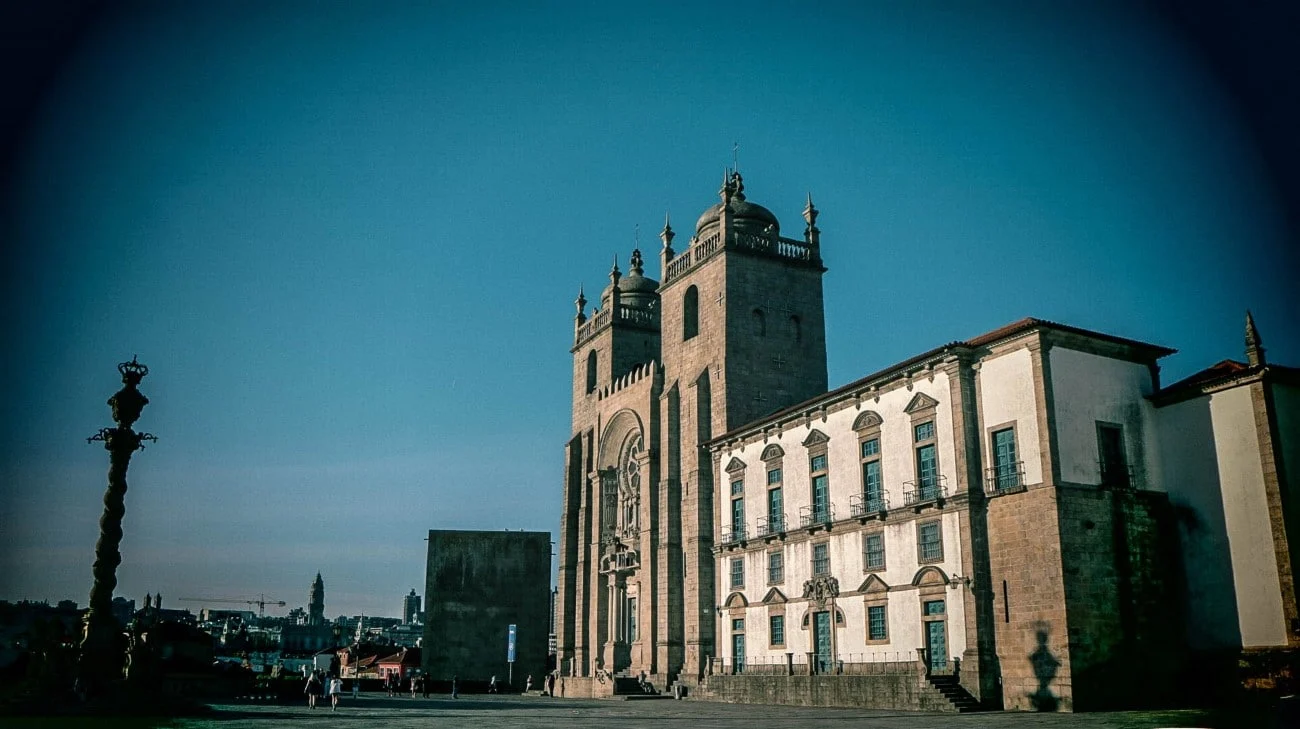 The Sé do Porto with its fortress-like twin towers and the pillory column