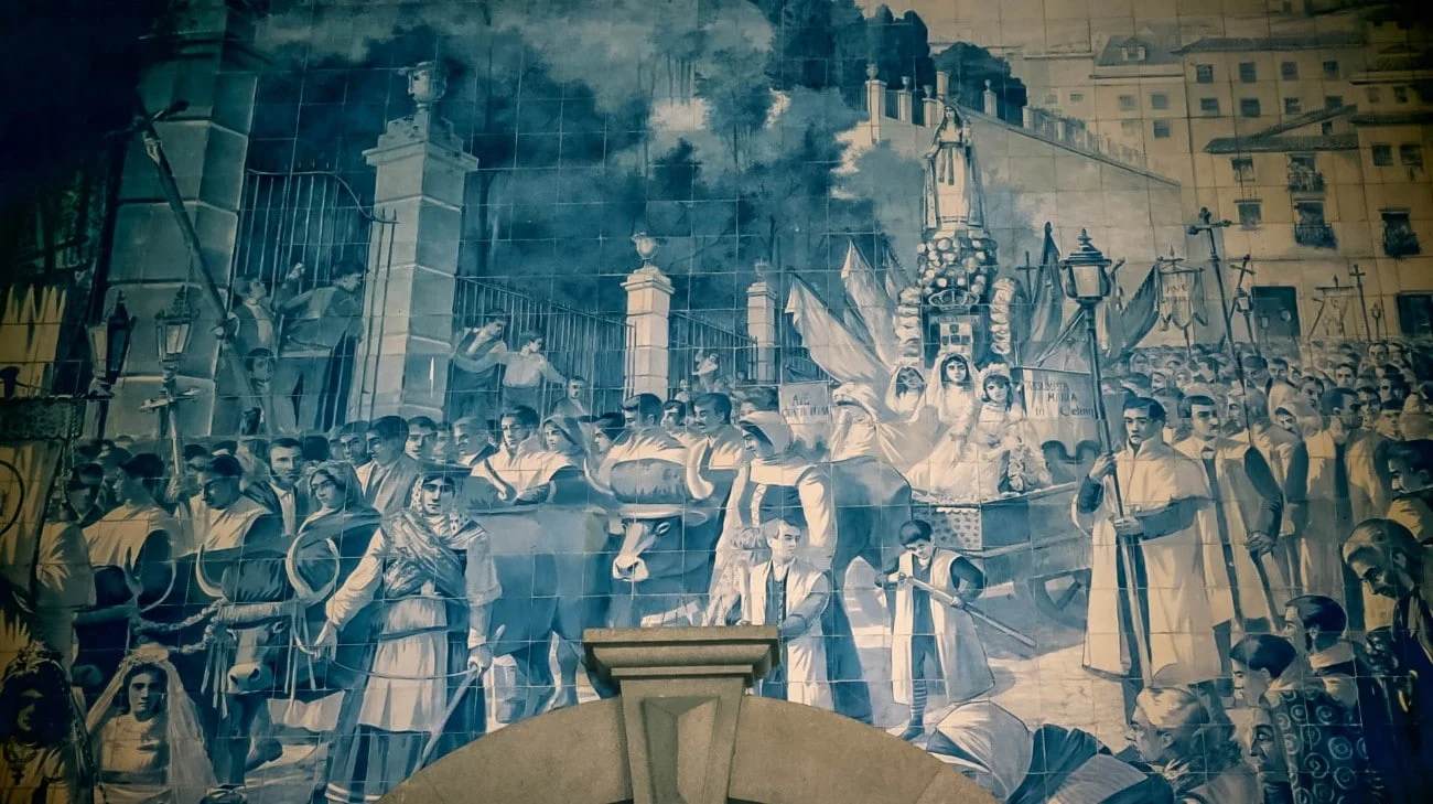 Azulejo tile mural of a religious procession inside São Bento station