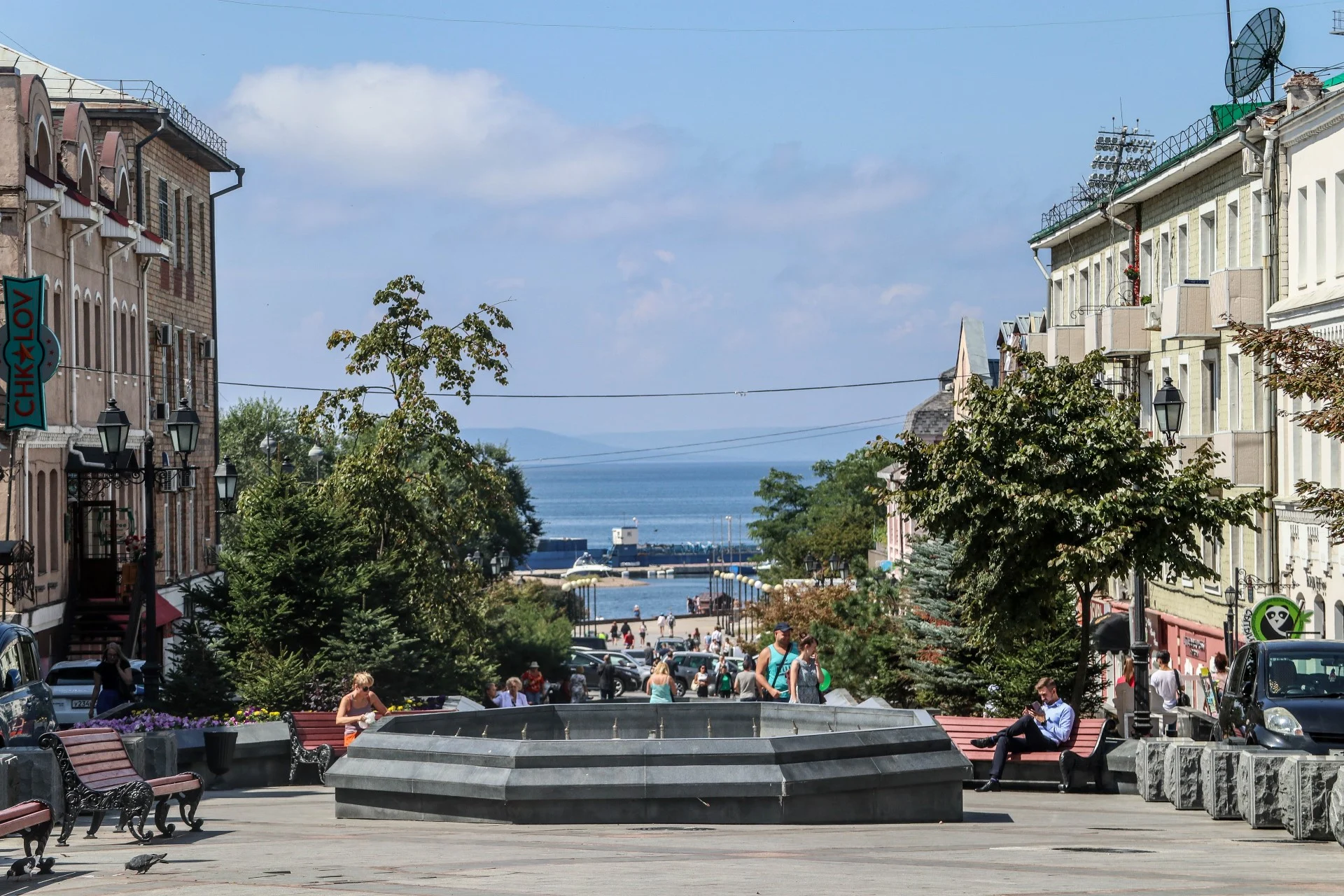 Admiral Fokin Street, the main pedestrian drag, runs down toward the bay