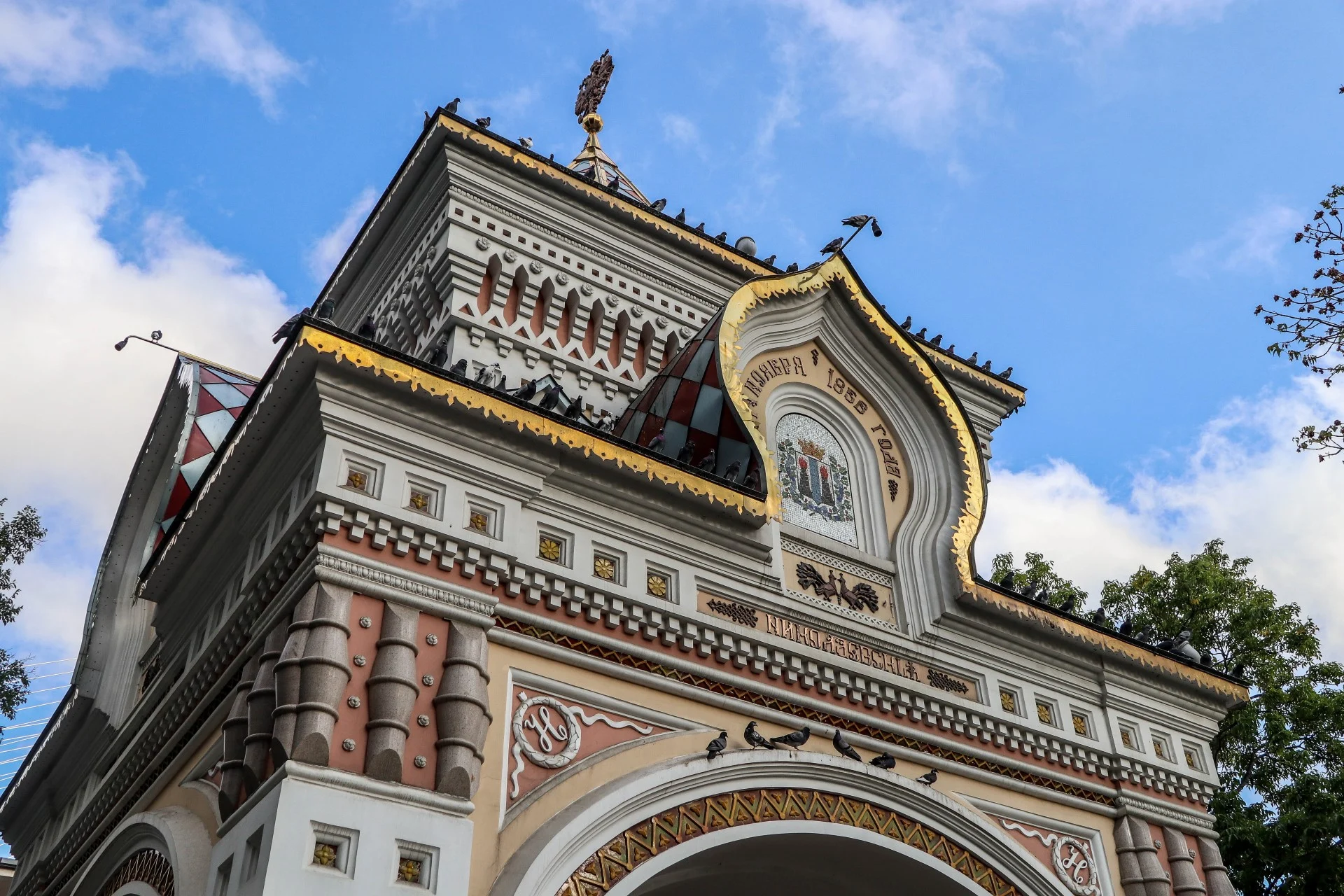 Close-up of the Tsesarevich Arch’s Russian revival details, kokoshniks and decorative tilework