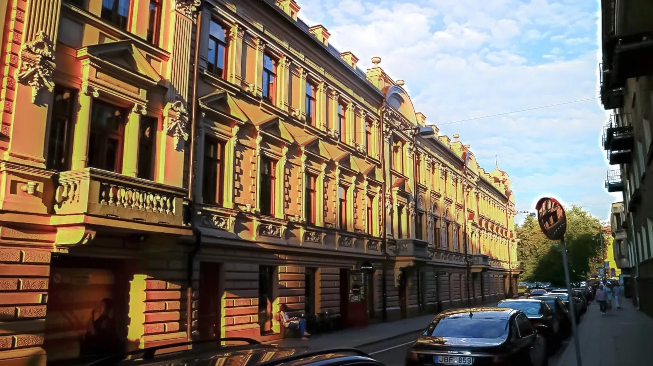 Golden hour hitting the neoclassical facades along Gedimino prospektas